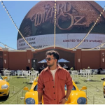 Indian travel influencer Anunay Sood smiling during one of his travel shoots before his sudden passing in Dubai at age 32.