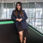 Ankiti Bose speaking at a launch event for Terra Invest in London, following the deal announcement with Shookra Clinics.